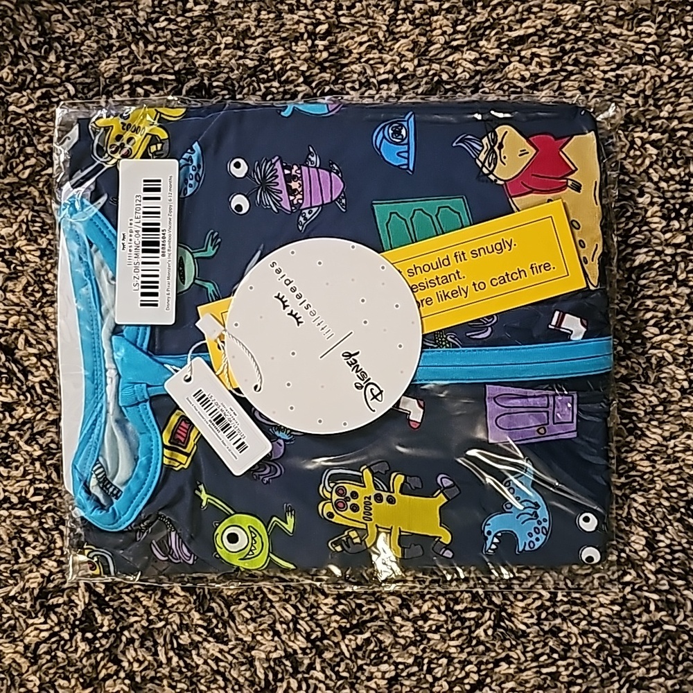 New In bag Little sleepies Monsters Inc 6-12 zippy